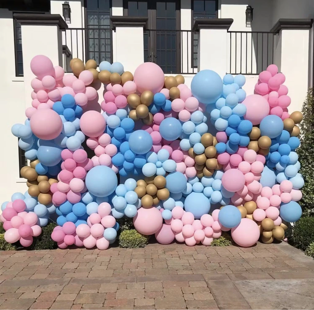gender reveal balloons nearby