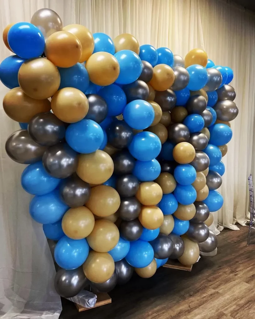 blue and gold balloon wall