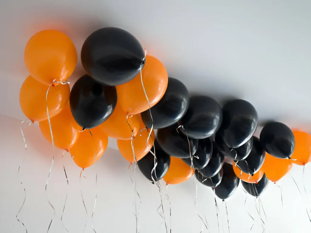 orange and black ceiling balloon decor